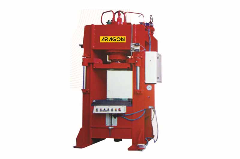 Large red mechanical machine for industrial use.